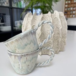 Lysebl� kop med snoet hank