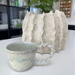 Lysebl� kop med snoet hank