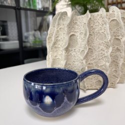 Kop med hank i syren og bl�