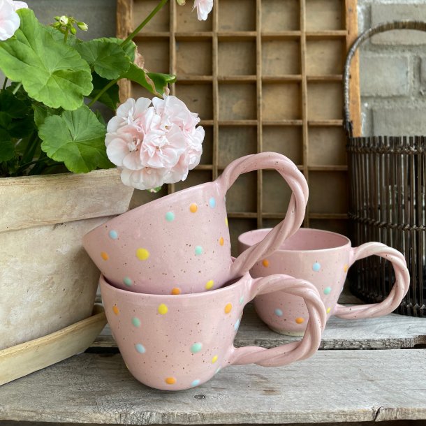 Lyser�d kop med dots og snoet hank