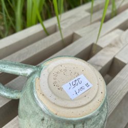 Kop med hank i smuk gr�n glasur