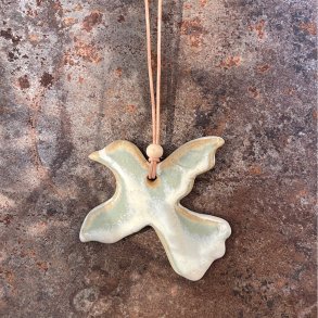 Fredsdue i creme gr�nne nuancer