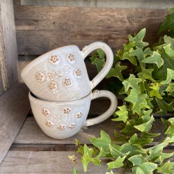 Mor kop med sm� blomster