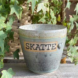 Kop med teksten � Skatte� i smukke nuancer