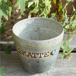 Kop med teksten � Skatte� i smukke nuancer