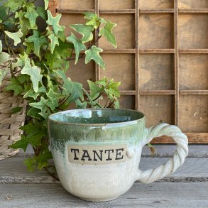 Tante kop i smukke nuancer af creme og gr�n. 