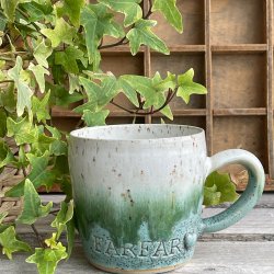 Farfar kop i gr�nne nuancer