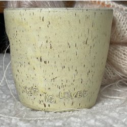 Garnsk�l med teksten � All you knit is love�