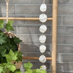 Oph�ng med keramik strandskaller