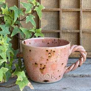 Mor kop i lyser�d med nuancer af gul, orange og brun.