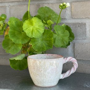 Kop med snoet hank i smukke krystaller