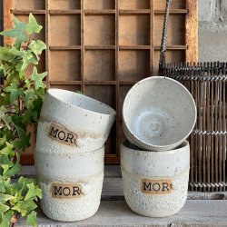 Mor kop i flot kraterglasur