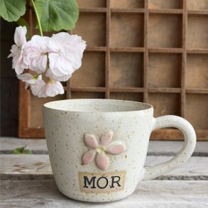 Mor kop med blomst